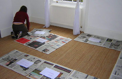 Paper prototyping a kitchen to scale with newspaper